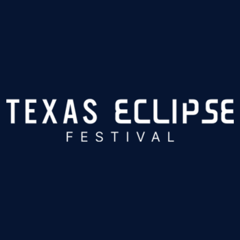Texas Eclipse Festival in white writing on navy blue background